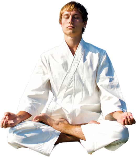 Martial Arts Lessons for Adults in Butte MT - Young Man Thinking and Meditating in White